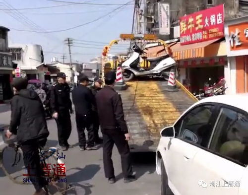 溪頭鎮(zhèn)春節(jié)期間交通嚴(yán)管 車站至鎮(zhèn)政府路段違章停車一律拖車